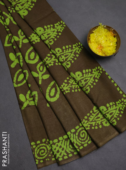 Batik cotton saree mehendi green with allover prints and batik printed border