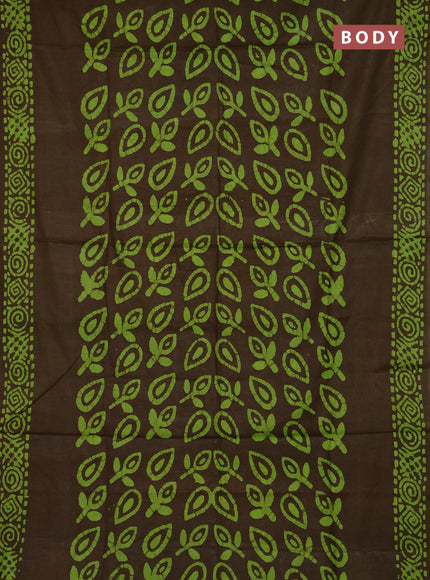 Batik cotton saree mehendi green with allover prints and batik printed border