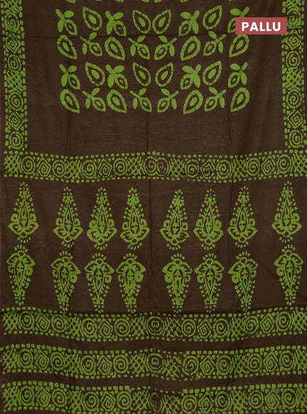 Batik cotton saree mehendi green with allover prints and batik printed border