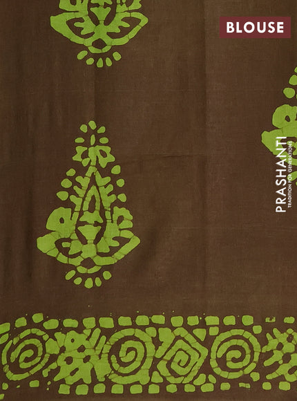 Batik cotton saree mehendi green with allover prints and batik printed border