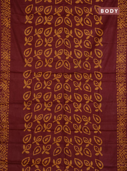 Batik cotton saree maroon with allover prints and batik printed border