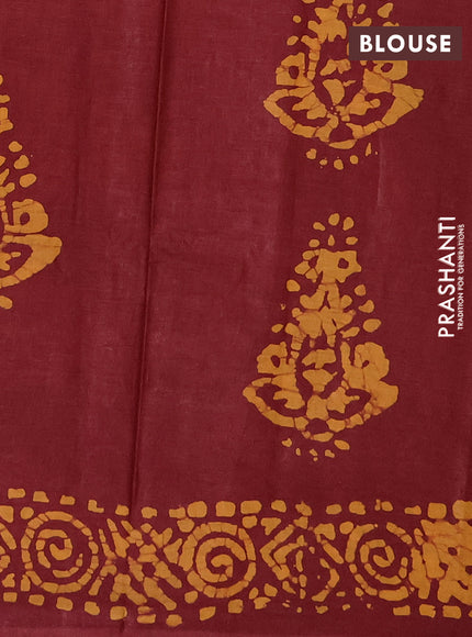 Batik cotton saree maroon with allover prints and batik printed border