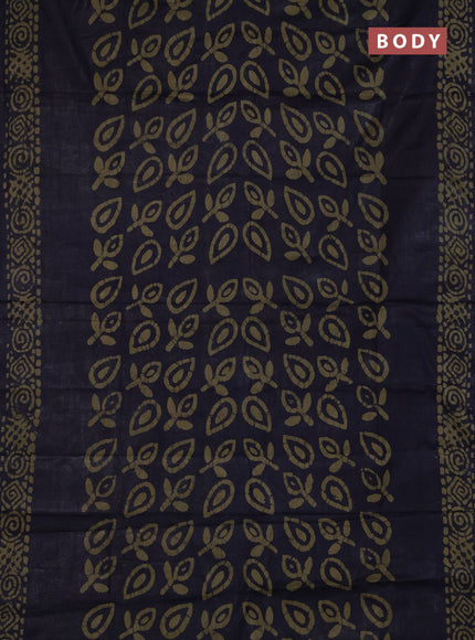 Batik cotton saree black with allover prints and batik printed border