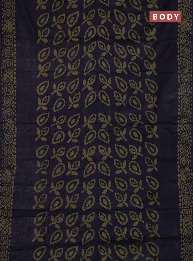 Batik cotton saree black with allover prints and batik printed border