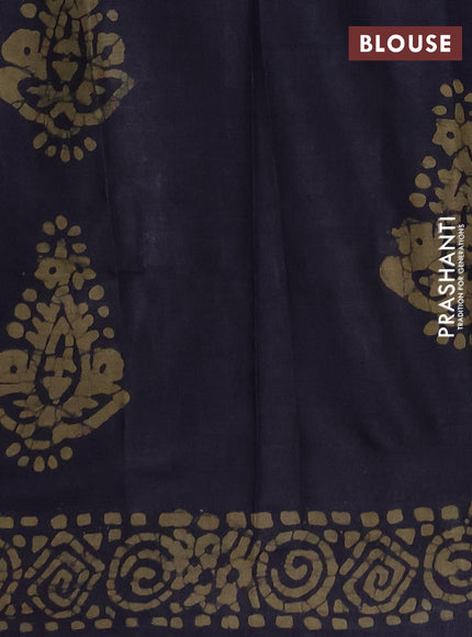 Batik cotton saree black with allover prints and batik printed border