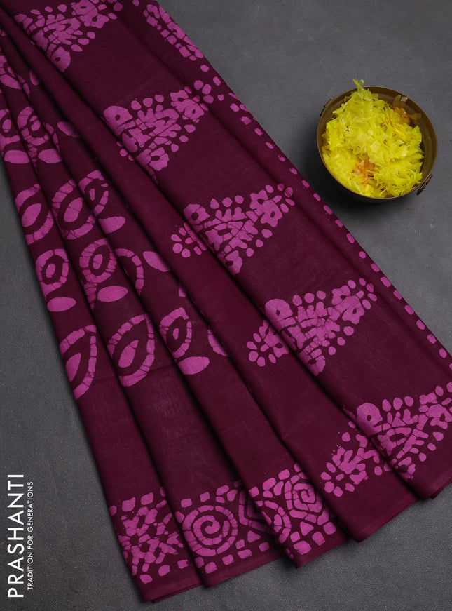 Batik cotton saree magenta pink with allover prints and batik printed border