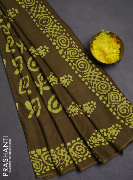 Batik cotton saree mehendi green with allover prints and batik printed border