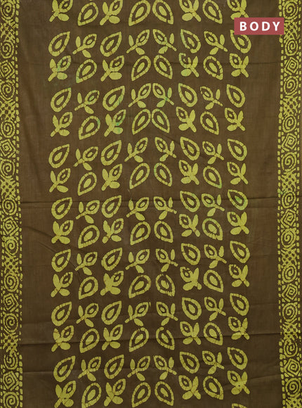 Batik cotton saree mehendi green with allover prints and batik printed border