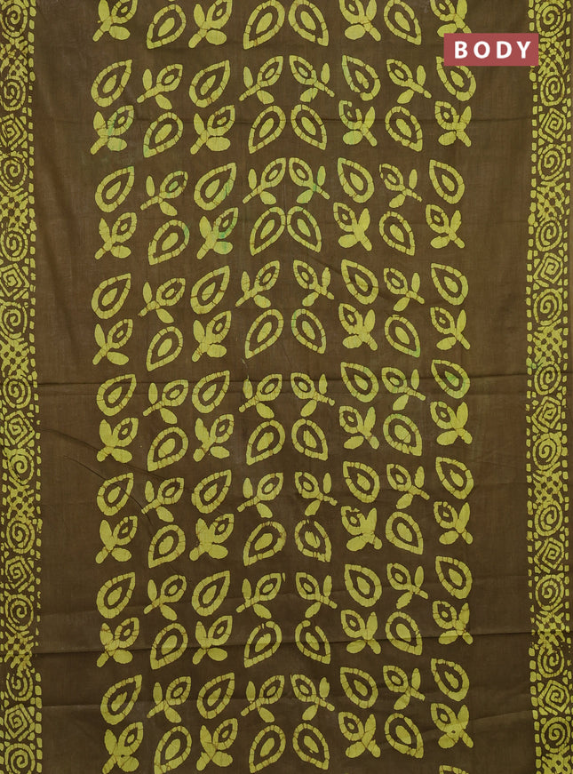 Batik cotton saree mehendi green with allover prints and batik printed border
