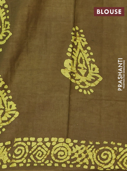 Batik cotton saree mehendi green with allover prints and batik printed border