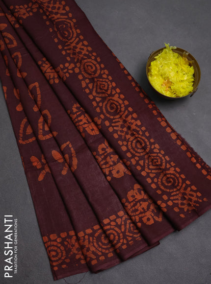 Batik cotton saree deep maroon with allover prints and batik printed border