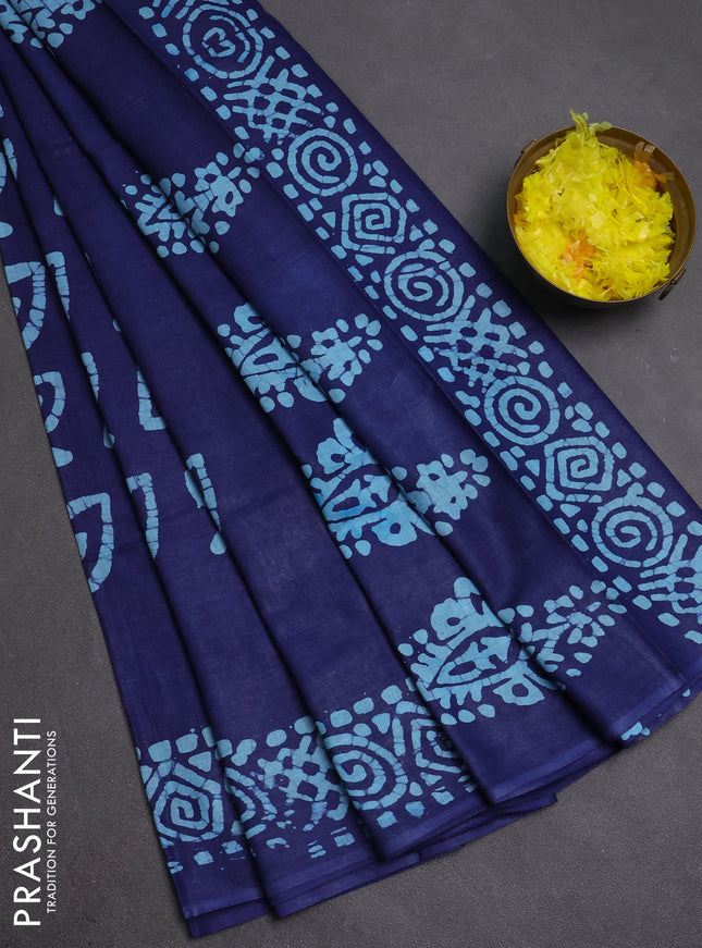 Batik cotton saree navy blue with allover prints and batik printed border