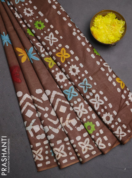 Batik cotton saree brown with allover prints and batik printed border