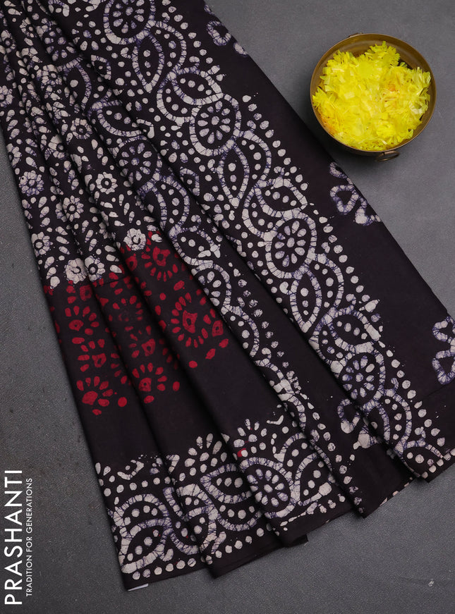 Batik cotton saree navy blue with allover prints and batik printed border