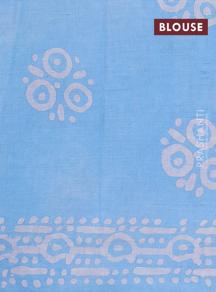 Batik cotton saree multi colour and pastel blue with allover prints and batik printed border