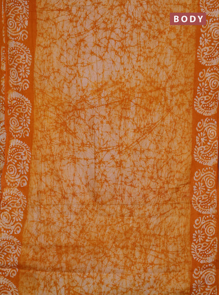 Batik cotton saree mango yellow with allover prints and batik printed border