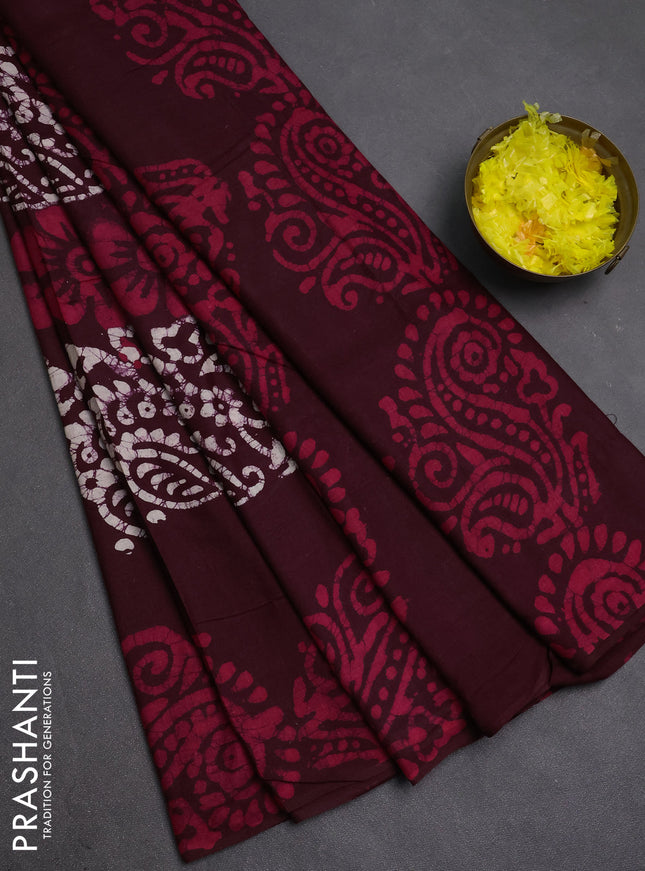 Batik cotton saree deep wine shade with allover prints and batik printed border