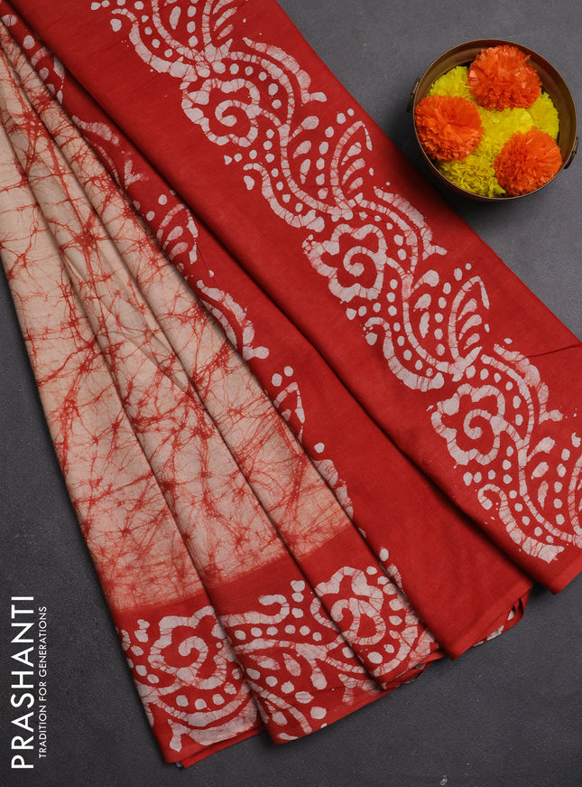 Batik cotton saree beige and red with allover prints and batik printed border