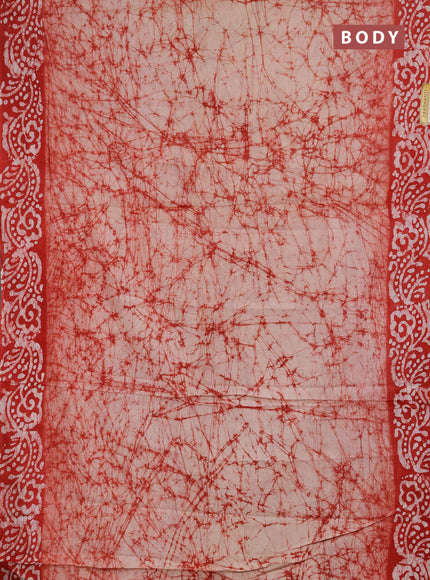 Batik cotton saree beige and red with allover prints and batik printed border