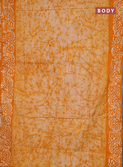 Batik cotton saree mango yellow with allover prints and batik printed border