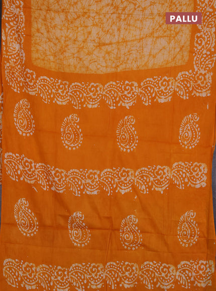 Batik cotton saree mango yellow with allover prints and batik printed border