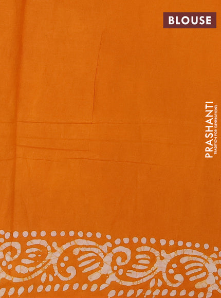 Batik cotton saree mango yellow with allover prints and batik printed border