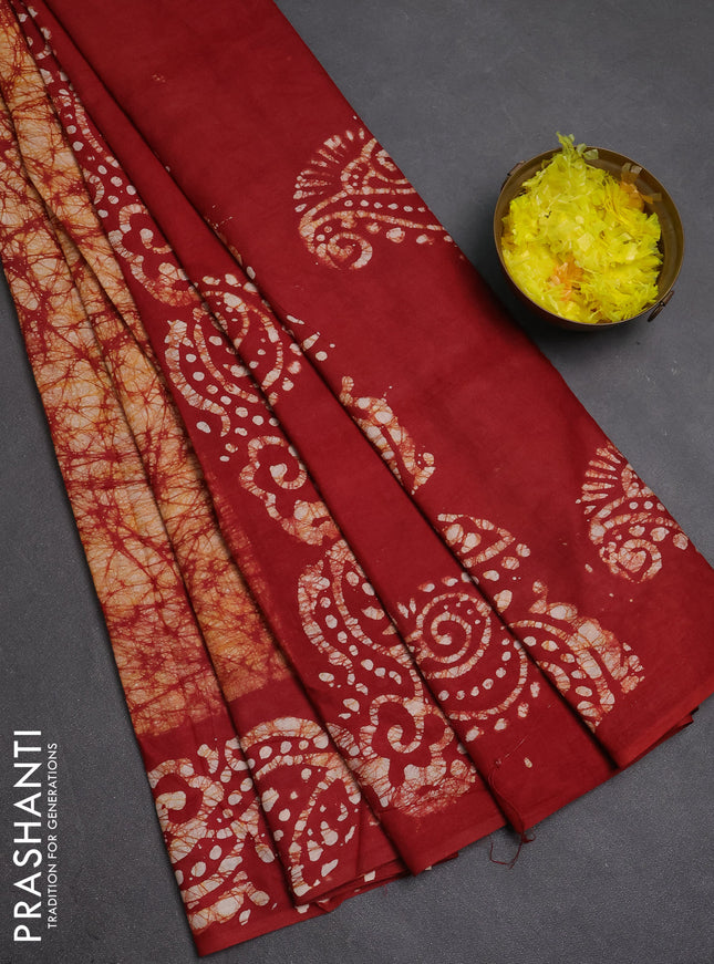 Batik cotton saree maroon with allover prints and batik printed border