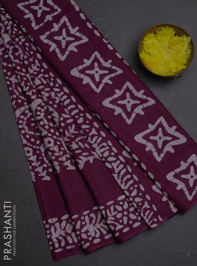Batik cotton saree wine shade with allover prints and batik printed border