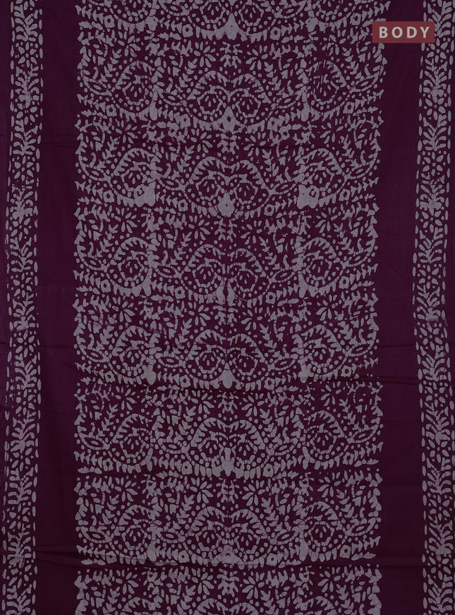 Batik cotton saree wine shade with allover prints and batik printed border