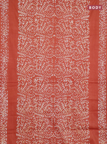 Batik cotton saree rust shade with allover prints and batik printed border