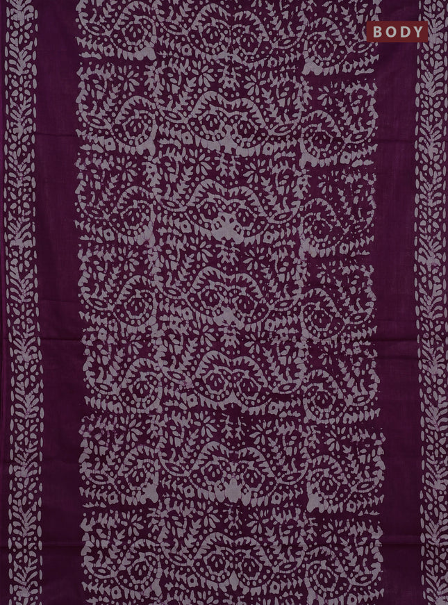 Batik cotton saree wine shade with allover prints and batik printed border