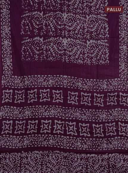 Batik cotton saree wine shade with allover prints and batik printed border