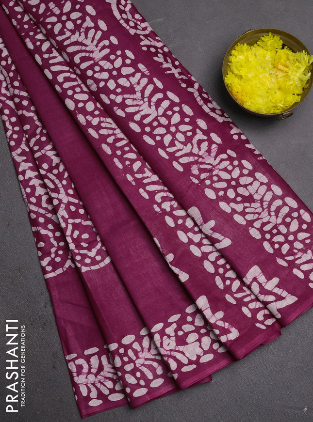 Batik cotton saree magenta pink with allover prints and batik printed border