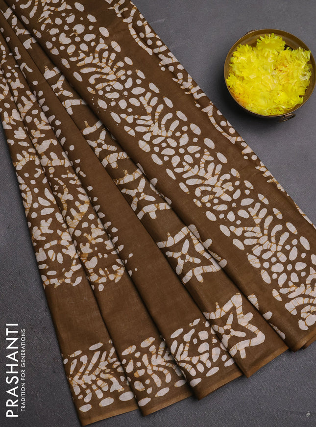 Batik cotton saree lime green with allover prints and batik printed border