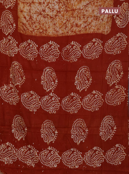 Batik cotton saree rust shade with allover prints and batik printed border