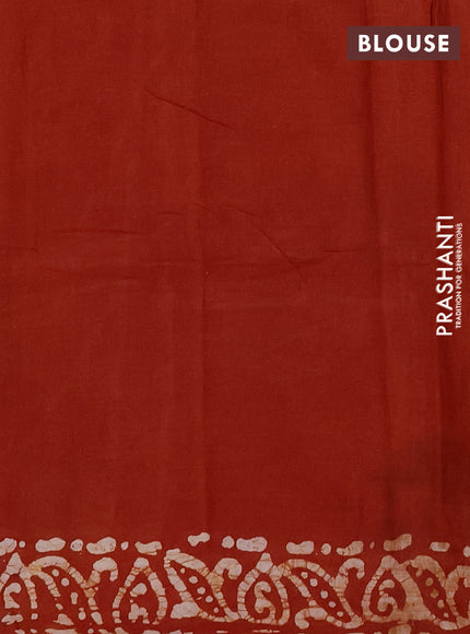 Batik cotton saree rust shade with allover prints and batik printed border