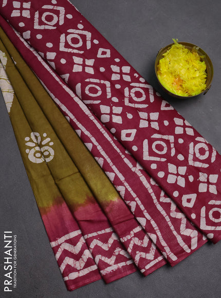 Batik cotton saree dark mustard and magenta pink with batik butta prints and batik printed border