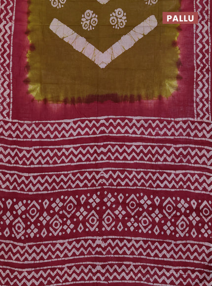 Batik cotton saree dark mustard and magenta pink with batik butta prints and batik printed border