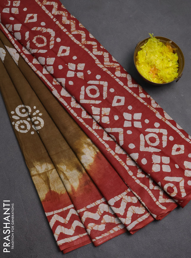 Batik cotton saree mehendi green and rust shade with batik butta prints and batik printed border