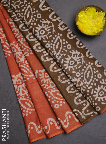 Batik cotton saree rust shade and mustard green with batik butta prints and batik printed border