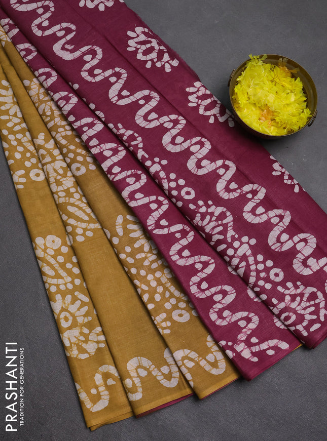 Batik cotton saree mustard yellow and magenta pink with batik butta prints and batik printed border