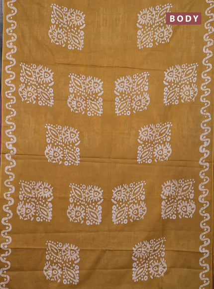 Batik cotton saree mustard yellow and magenta pink with batik butta prints and batik printed border