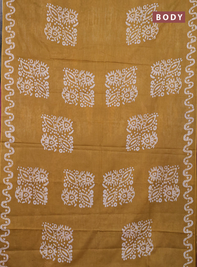 Batik cotton saree mustard yellow and magenta pink with batik butta prints and batik printed border