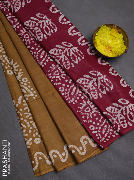 Batik cotton saree mustard green and magenta pink with batik butta prints and batik printed border