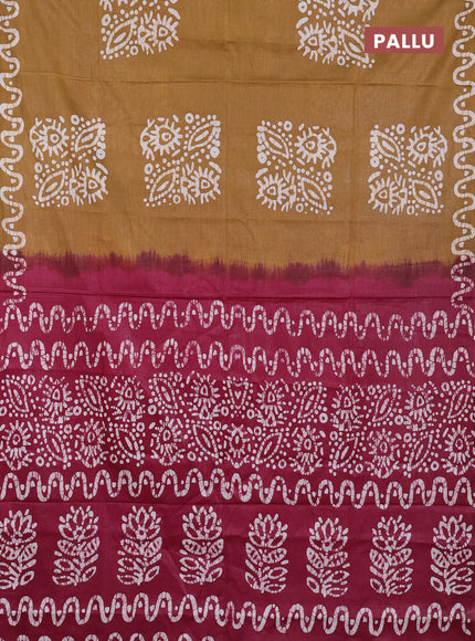 Batik cotton saree mustard green and magenta pink with batik butta prints and batik printed border