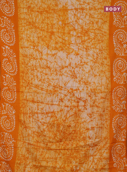 Batik cotton saree mango yellow with allover prints and batik printed border