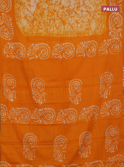 Batik cotton saree mango yellow with allover prints and batik printed border