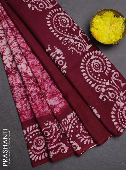 Batik cotton saree wine shade with allover prints and batik printed border
