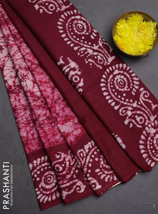 Batik cotton saree wine shade with allover prints and batik printed border