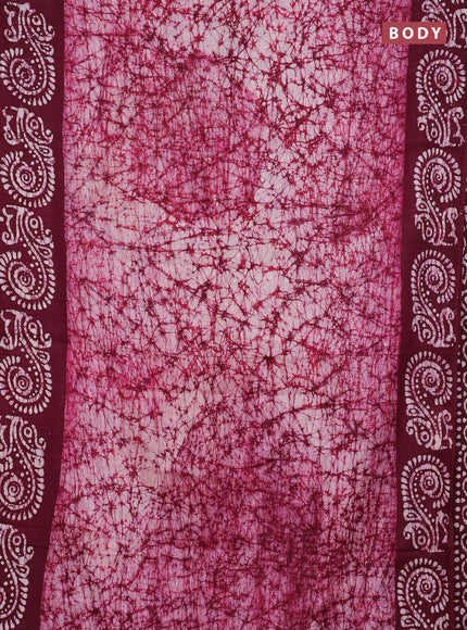 Batik cotton saree wine shade with allover prints and batik printed border